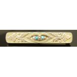 A VICTORIAN BICOLOUR 9CT GOLD, TURQUOISE AND SEED PEARL BAR BROOCH The flat rectangular bar with