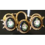 A VICTORIAN 18CT GOLD AND MICRO-MOSAIC BRACELET The articulated bracelet of six oval onyx panels,