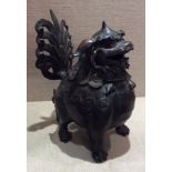 A JAPANESE BRONZE INCENSE BURNER Cast as a mythical beast, with stylized geometric hair and mane