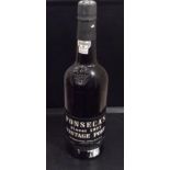 A SEALED BOTTLE OF FINEST 1977 PORT With guarantee label '314692'.