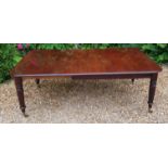 AN EARLY VICTORIAN CUBAN MAHOGANY EXTENDING DINING TABLE Rectangular shape to top with rounded