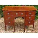 A GEORGIAN MAHOGANY AND LINE INLAID BOW FRONTED SIDEBOARD With an arrangement of drawers and