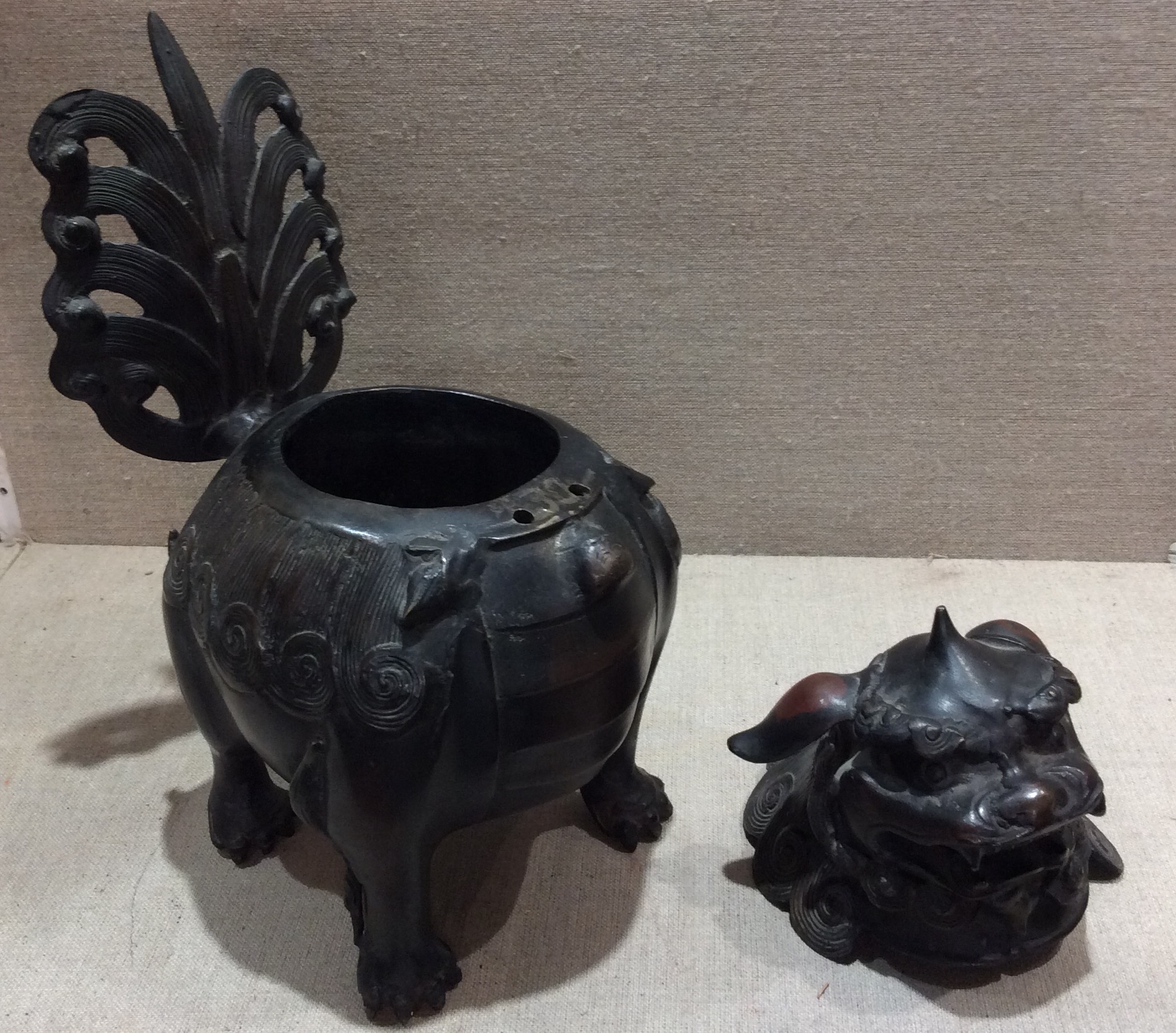 A JAPANESE BRONZE INCENSE BURNER Cast as a mythical beast, with stylized geometric hair and mane, - Image 2 of 2