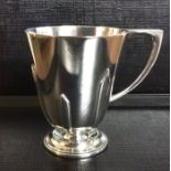 AN ART DECO HALLMARKED SILVER TANKARD Of tapering form, with geometric prong design and circular