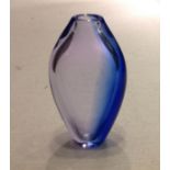 A CIRCA 1960S BLUE AND CLEAR STUDIO GLASS VASE The fold over neck flaring gently to shoulder and