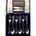 A CASED 19TH CENTURY SILVER AND MOTHER OF PEARL FRUIT KNIFE AND FORK With beaded edge design,