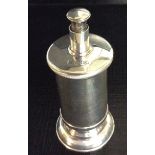 AN EDWARDIAN HALLMARKED SILVER PEPPER MILL Of cylindrical shape, with push mechanism and gadrooned