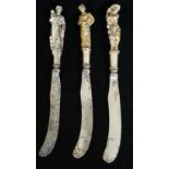THREE 18TH CENTURY DUTCH KNIVES With figural handles, Madonna and child, Orientals.