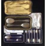 A COLLECTION OF EARLY 20TH CENTURY HALLMARKED SILVER CUTLERY To include a pair of serving spoons,
