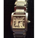 CARTIER, 2300, A LADIES' LATE 20TH CENTURY STAINLESS STEEL WRISTWATCH Having a square cream dial,