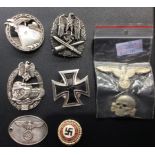 A COLLECTION OF WORLD WAR II STYLE GERMAN NAZI WHITE METAL CAP BADGES Including a naval blockade