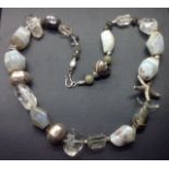 A HEAVY ROCK CRYSTAL, AGATE AND WHITE METAL BEAD NECKLACE The semiprecious stone beads polished