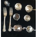 A COLLECTION OF VARIOUS SILVER ITEMS To include a pair of heavy cruets.