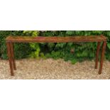 A 19TH CENTURY CHINESE HARDWOOD ALTAR TABLE With applied scrolls ends, raised on square tapering