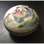 A CHINESE PORCELAIN JAR AND COVER Decorated with ladies playing board games, in a garden setting,