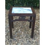 A 19TH CENTURY CHINESE HARDWOOD OCCASIONAL TABLE With white marble inset top.