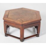 AN 18TH/19TH CENTURY CHINESE HUANGHUALI AND HUAMU HEXAGONAL LOW TABLE With finely carved border