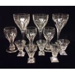 A COLLECTION OF ANTIQUE DRINKING GLASSES To include three tapering fluted wine glasses, together
