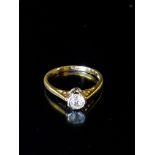 A HALLMARKED 18CT GOLD AND DIAMOND SOLITAIRE RING The old cut diamond illusion set in white gold