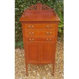 AN EARLY 20TH CENTURY MAHOGANY AND CROSSBANDED MUSIC CABINET With pierced galleried top over three