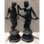 A PAIR OF LATE 19TH/EARLY 20TH CENTURY FRENCH CAST IRON FIGURES 'Modistie' and 'Gaitie', dancing