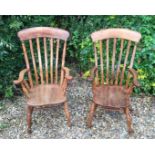 A MATCHED PAIR OF 19TH CENTURY BEECH WOOD AND ELM LATHE BACK WINDSOR CHAIRS With shaped armrests