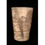 AN 18TH/19TH CENTURY HORN CUP Finely engraved with a huntsmen on horseback, with hounds in a