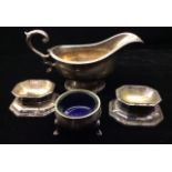 WALKER & HALL, AN EARLY 20TH CENTURY SILVER PLATED SAUCE BOAT With gadrooned edge, scroll handle and