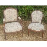 A 19TH CENTURY FRENCH SPOONBACK STANDARD CHAIR The carved walnut frame crested with a floral bough