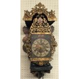 A 19TH CENTURY CONTINENTAL WALL MOUNTING BRACKET CLOCK With painted decoration in the form of