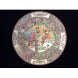 A LARGE 20TH CENTURY CHINESE PORCELAIN CHARGER In famille rose palette with pink flowers on a