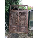 A LATE 19TH/EARLY 20TH CENTURY MOORISH DOORS AND FRAME. (155cm x 238cm)