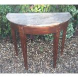 A 19TH CENTURY CONTINENTAL FRUITWOOD DEMILUNE TABLE With marble top, raised on square section