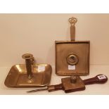 AN 18TH CENTURY BRASS AND WALNUT CELLAR LIGHT Together with two brass chambersticks, rectangular and