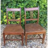 A PAIR OF GEORGIAN MAHOGANY PROVINCIAL STANDARD CHAIRS With solid seats.