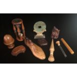 A SELECTION OF WOODEN AND ORNAMENTAL ITEMS To include a carved Chinese figure, a Chinese Bi on