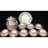 LIMOGES, FRANCE, AN EARLY 20TH CENTURY PORCELAIN TEA SERVICE Comprising a large bread and butter