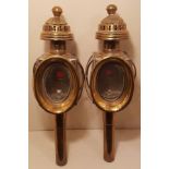 A PAIR OF 19TH CENTURY BRASS COACHING LANTERNS. (14cm x 44cm)