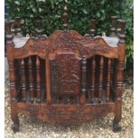 A RARE 18TH CENTURY FRENCH FRUITWOOD BREAD HUTCH/PATETIERE With turned finials above a shaped apron,