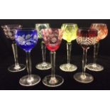WITHDRAWN!!! A COLLECTION OF SEVEN 20TH CENTURY CZECHOSLOVAKIAN OVERLAID GLASS WINE GOBLETS Three