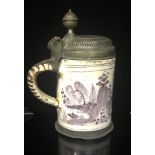 AN EARLY 18TH CENTURY DELFTWARE AND PEWTER LIDDED TANKARD Hand painted in puce, with a scholar