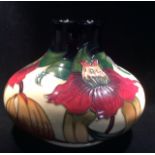 MOORCROFT POTTERY, DESIGNED BY NICOLA SLANEY, A 20 TH CENTURY SQUAT FORM VASE Anna Lily pattern,