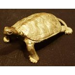 A LATE 19TH CENTURY JAPANESE MEIJI PERIOD BRONZE MODEL OF A TORTOISE Cast with fine detail to