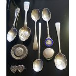 A COLLECTION OF GEORGIAN SILVER AND LATER TEASPOONS Along with Victorian silver Coronation brooches,