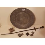 A COLLECTION OF FOUR ANTIQUE IRON MACE HEADS Along with an early short sword and silvered