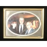 A PERSONAL FAMILY PHOTOGRAPH OF SIR NICHOLAS WINTON Alongside former American President Bill