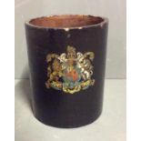 AN EARLY 19TH CENTURY PAPIER MÂCHÉ CYLINDRICAL POT Having a black ground bearing the Royal of
