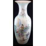 A 19TH CENTURY LARGE CHINESE VASE Painted with mother and children in a garden setting and bearing