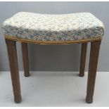 A QUEEN ELIZABETH II CORONATION STOOL With floral fabric upholstered seat, raised on four