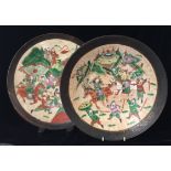 A PAIR OF CHINESE CIRCULAR CHARGERS Enamel decorated with battle scenes, Circa 1900. (d 37cm)